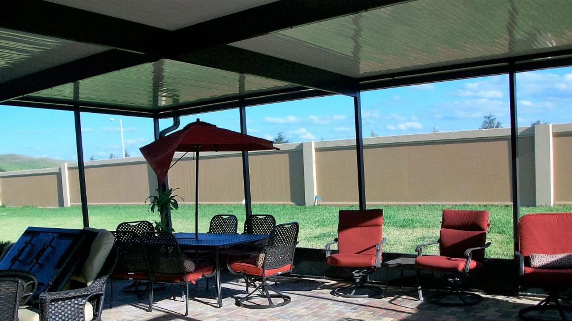 Inside a newly constructed screen room with a roof at a home in Riverview, FL.