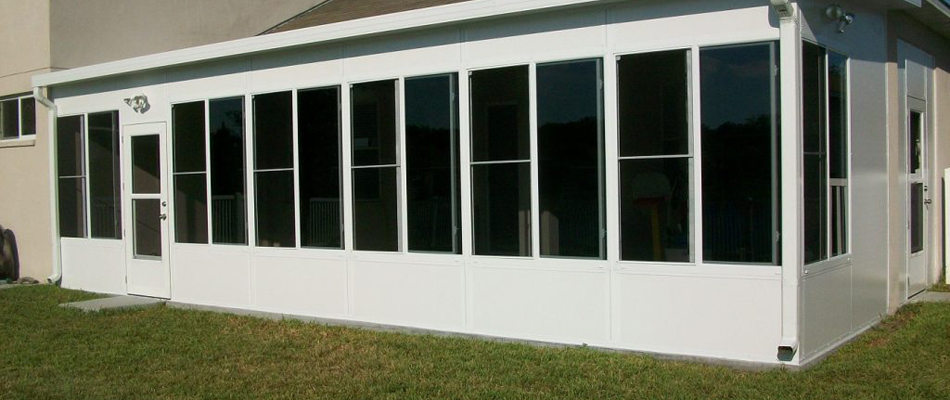 Glass room enclosure installed for a home in Apollo Beach, FL.