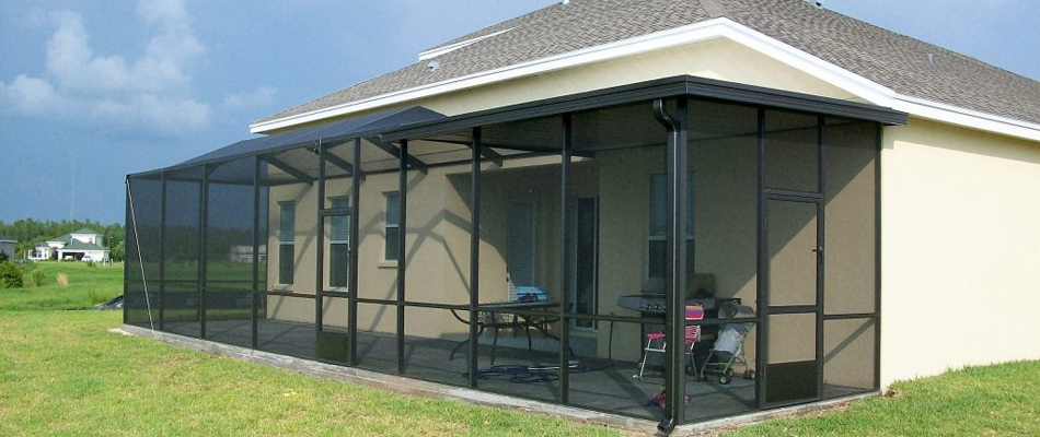 A screened in patio installed for a property in Ruskin, FL.